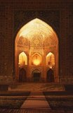 The Registan contains three madrasahs (schools), the Ulugh Beg Madrasah (1417–1420), Tilya-Kori Madrasah (1646–1660) and the Sher-Dor Madrasah (1619–1636).<br/><br/>

The Tilya-Kori Madrasah was built in the mid-17th century by the Shaybanid Amir Yalangtush. The name Tilya-Kori means ‘gilded’ or ‘gold-covered’, and the entire building is lavishly decorated with elaborate geometrical arabesques and sura from the Qur’an both outside and especially within. A magnificent turquoise dome rises over the left (western) side of the building, decorated inside with gilded Qur’anic inscriptions and delicate muqarnas hanging ‘stalactite’ decorations. The interior of the madrasah comprises rooms for students with accompanying vestibules surrounding three-sides of a square courtyard, while a domed mosque occupies the fourth.<br/><br/>

The dome rises in four stages. A rectangular plinth forms the primary prayer hall and rises above the madrasa walls. Next, two terraced octagonal tiers rise to support a high cylindrical drum. The dome's monochrome blue color contrasts pleasingly with the drum's polychrome decoration formed by bands of Arabic calligraphy taken from the Qur’an.